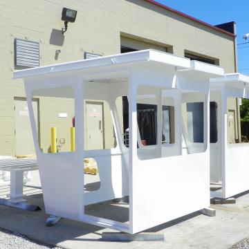 Guardshacks for a secure facility blast, primed & coated at OTN Shop, ready for delivery and reinstallation.